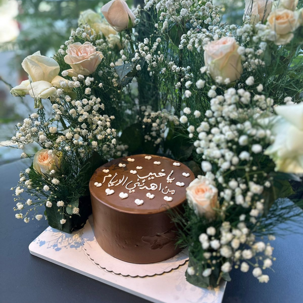 Breathtaking Combo of Cake and Roses Arrangement